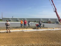 Finishing Pouring the Concrete in the M Warehouse