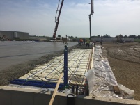 Finishing Pouring the Concrete in the M Warehouse