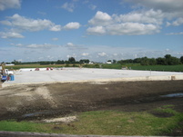 Pouring the concrete pad