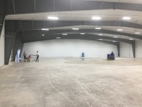 Scrubbing the Floor in the M Warehouse before Polishing