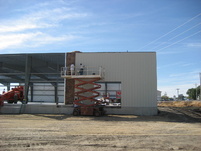 Placing metal siding