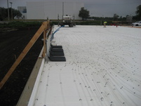 Laid foam insulation and 48,000 feet of in-floor-heat tubing